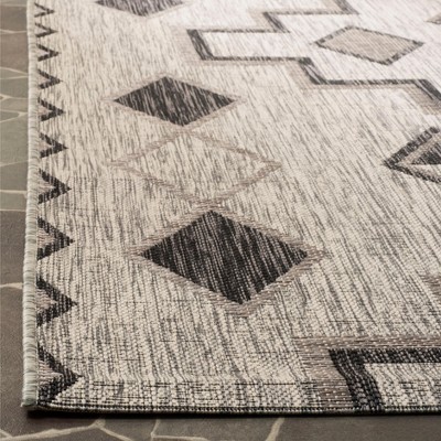 Easy-Care 59" Round Gray Synthetic Indoor/Outdoor Rug