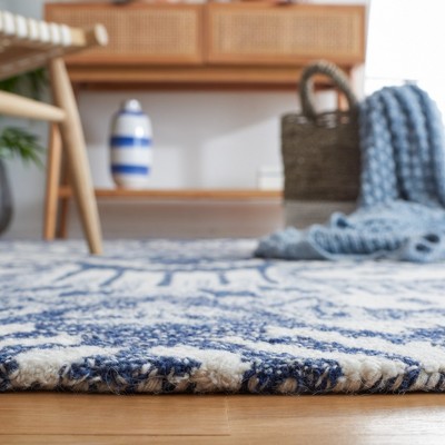 Handmade Bohemian Blue and Ivory Wool Area Rug 8' x 10'