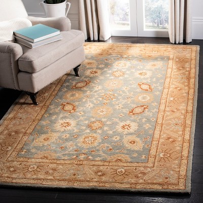 Handmade Round Blue Wool Tufted Area Rug
