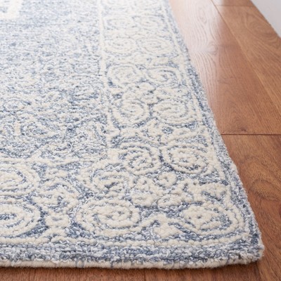 Ivory and Blue Handmade Wool Tufted 6' x 9' Abstract Rug