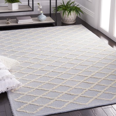 Light Blue and Ivory Hand-Tufted Wool 4' x 6' Area Rug
