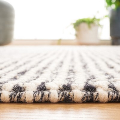 Natura 5' x 8' Black and Ivory Wool Handwoven Area Rug