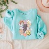 Simply Sage Market S.W.Smiley Retro Easter Collage Lightweight Garment Dyed Sweatshirt - 3 of 4