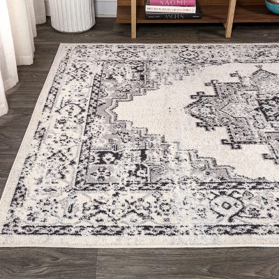 4' x 6' Dark Gray and Cream Medallion Synthetic Area Rug