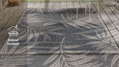 Blue and Beige Floral Synthetic 5' x 7' Area Rug