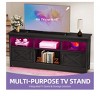 Black TV Stand for 65 Inch TVs, Farmhouse LED Entertainment Center with Cabinets, Power Outlet , Media Console for Living Room - 2 of 4
