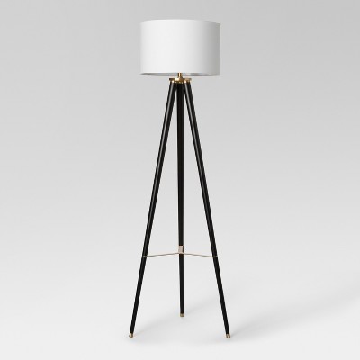 black tripod floor lamp