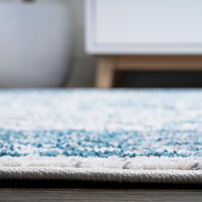 Blue and White Medallion 8' x 10' Synthetic Area Rug