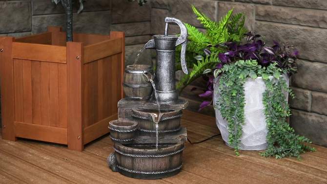 Sunnydaze 23"H Electric Polyresin Cozy Farmhouse Pump and Tiered Barrels Outdoor Water Fountain with LED Lights, 2 of 14, play video
