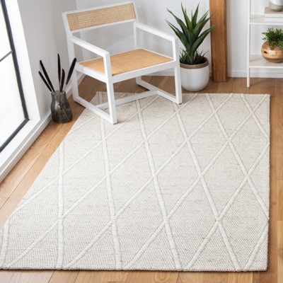 Ivory Flat Woven Wool and Synthetic 4' x 6' Area Rug