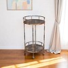 HomeRoots 18" Brown Iron Distressed Round Rolling Bar Cart - 2 of 4