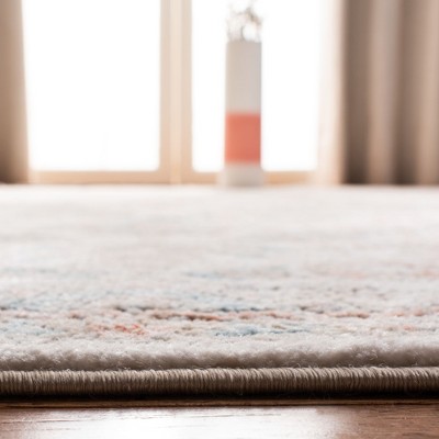 Ivory and Grey Medallion Synthetic 4' x 6' Area Rug