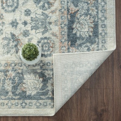 Ivory and Blue Floral Synthetic 5' x 7' Area Rug