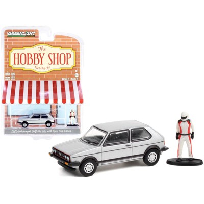 1976 Volkswagen Golf MkI GTI Silver and Race Car Driver Figurine "The Hobby Shop" Series 11 1/64 Diecast Model Car by Greenlight