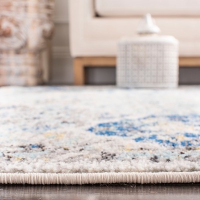 Elegant Ivory Square Synthetic Rug - Stain-Resistant and Reversible