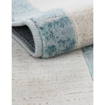 Turquoise and Ivory Rectangular Synthetic Area Rug