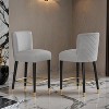27inch-counterstool, modern design with a smooth, light - colored fabric and circular footrest with a gold - Leovsnove - 2 of 4