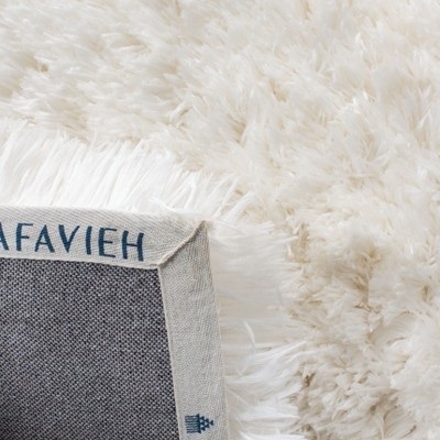 Ivory Hand-Tufted Shag Sheepskin 4' x 6' Area Rug
