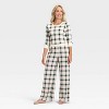 Women's Plaid Ribbed Holiday Matching Family Pajama Pants - Wondershop™ Cream - 3 of 4