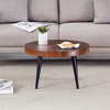 VYNXARIA Natural wood grain round coffee table,23.6" diameter.Features exquisite suction molding, natural wood texture,and black sprayed metal legs. - 3 of 4