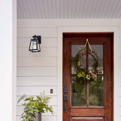Matte Black Motion Sensor Outdoor Wall Sconce with Clear Glass