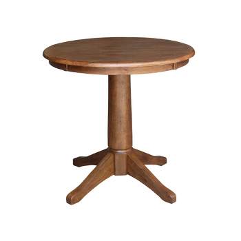 29.9" Dining Tables Laughlin Round Top Pedestal Distressed Oak - International Concepts