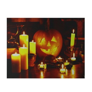 Northlight 19.5" Halloween Prelit LED Witch's Jack-O'-Lantern by Candlelight Canvas Wall Art - Orange/Yellow - 1 of 3
