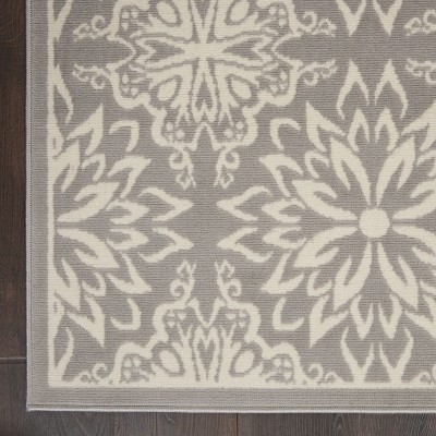 Ivory and Grey Floral Synthetic 5' x 7' Area Rug