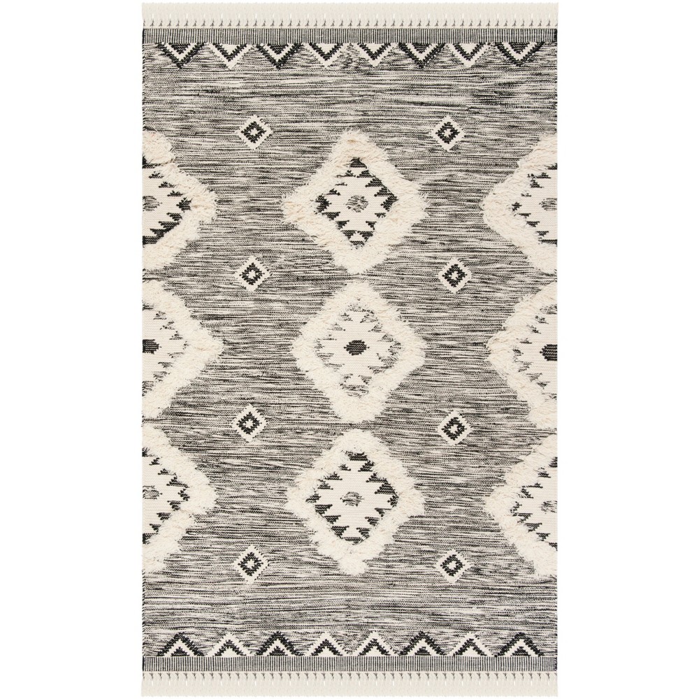 6'x9' Estella Geometric Design Knotted Rug Black/Ivory - Safavieh