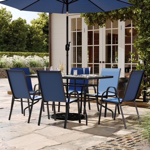 Flash Furniture Brazos 7 Piece Outdoor Patio Dining Set 55 Tempered Glass Patio Table With Umbrella Hole 6 Navy Flex Comfort Stack Chairs Target