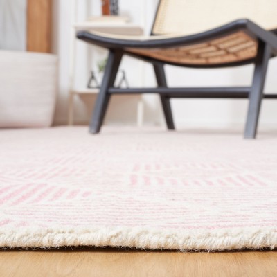 Handmade Pink and Ivory Abstract Wool Area Rug