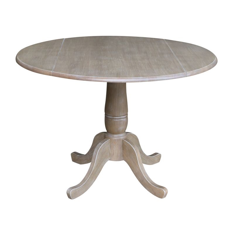 Nathaniel Round Dual Drop Leaf Pedestal Table Gray Taupe - International Concepts, 1 of 11