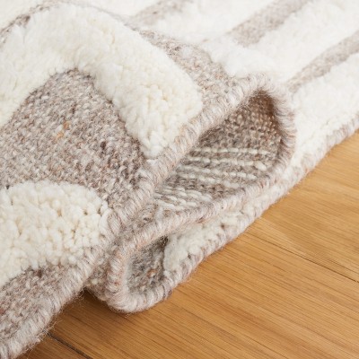 Ivory and Beige 8' x 10' Handmade Wool and Cotton Area Rug
