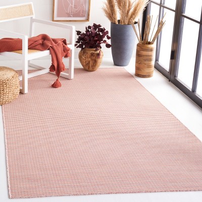 Beige and Terracotta Tufted Rectangular Synthetic Rug