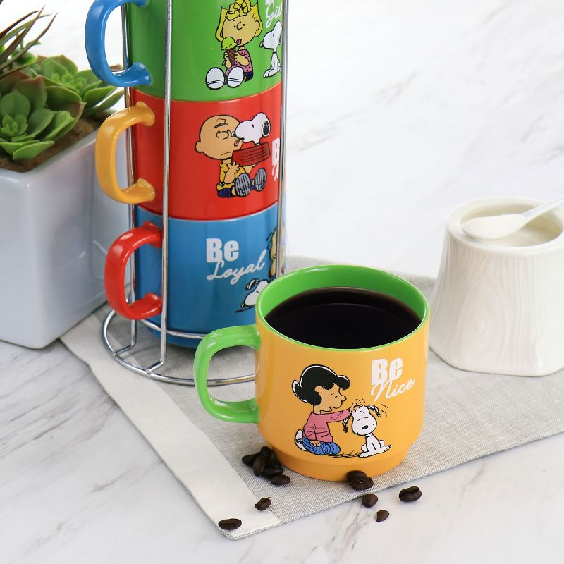 Gibson Peanuts Classic Gentle Reminders Collection 4 Piece Stoneware Stackable Mug Set with Metal Stand in Assorted Colors, 4 of 7
