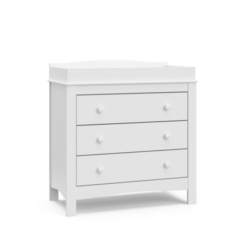 White dresser with store changing table topper