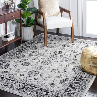 Ivory and Black Synthetic Round Area Rug
