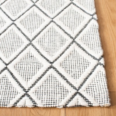 Elegant Marbella Handwoven Flatweave Black & Ivory Wool Rug