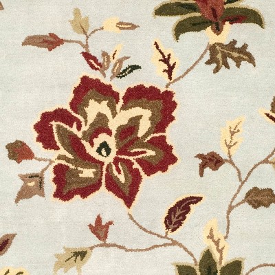 Handmade Light Blue Floral Wool 5' x 8' Area Rug