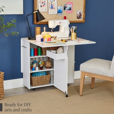 White Multipurpose Folding Table with Wheels and Storage Shelves