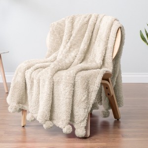 PAVILIA Fluffy Throw Blanket with Pompom, Lightweight Soft Plush Cozy Warm Pom Pom Fringe for Couch Sofa Bed - 1 of 4