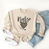 Simply Sage Market Women's Graphic Sweatshirt Leopard Nurse Heart - 3 of 3