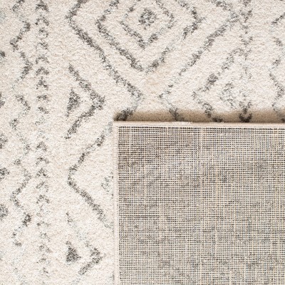 Ivory Boho-Chic Hand-Knotted Synthetic Area Rug