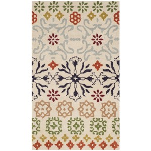 Wyndham WYD319 Hand Tufted Indoor Rugs - Safavieh - 1 of 4