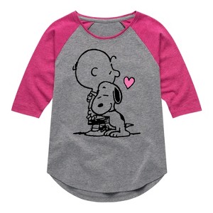 Girls' - Peanuts - Snoopy Charlie Hug Shirt Tail Raglan Graphic T-shirt - 1 of 4