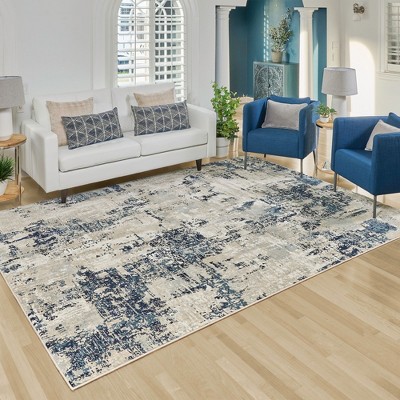 Ivory and Navy Abstract 5' x 7' Synthetic Area Rug