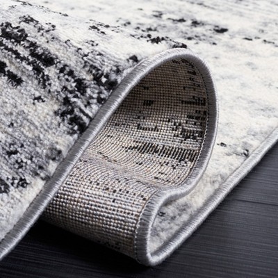4' x 6' Black Abstract Easy Care Synthetic Rug