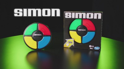 Hasbro Simon 2 Handheld Game 90s Memory Game Simon Says