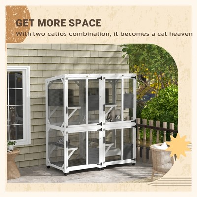 Large White and Gray Wooden Outdoor Cat House with Wheels