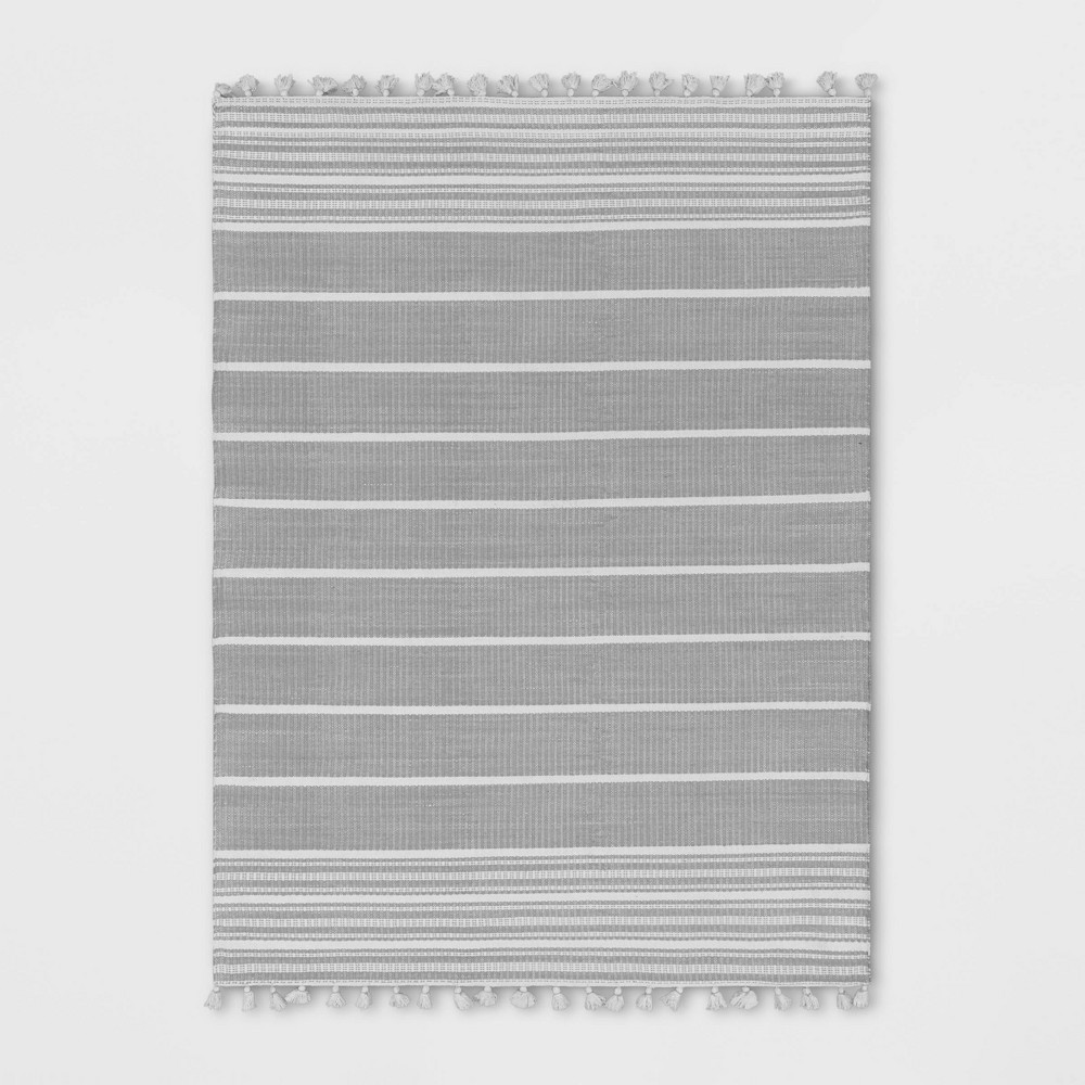 7' x 10' Pick Stitch Textured Stripe with Tassel Rug Jet Gray - Hearth & Hand™ with Magnolia